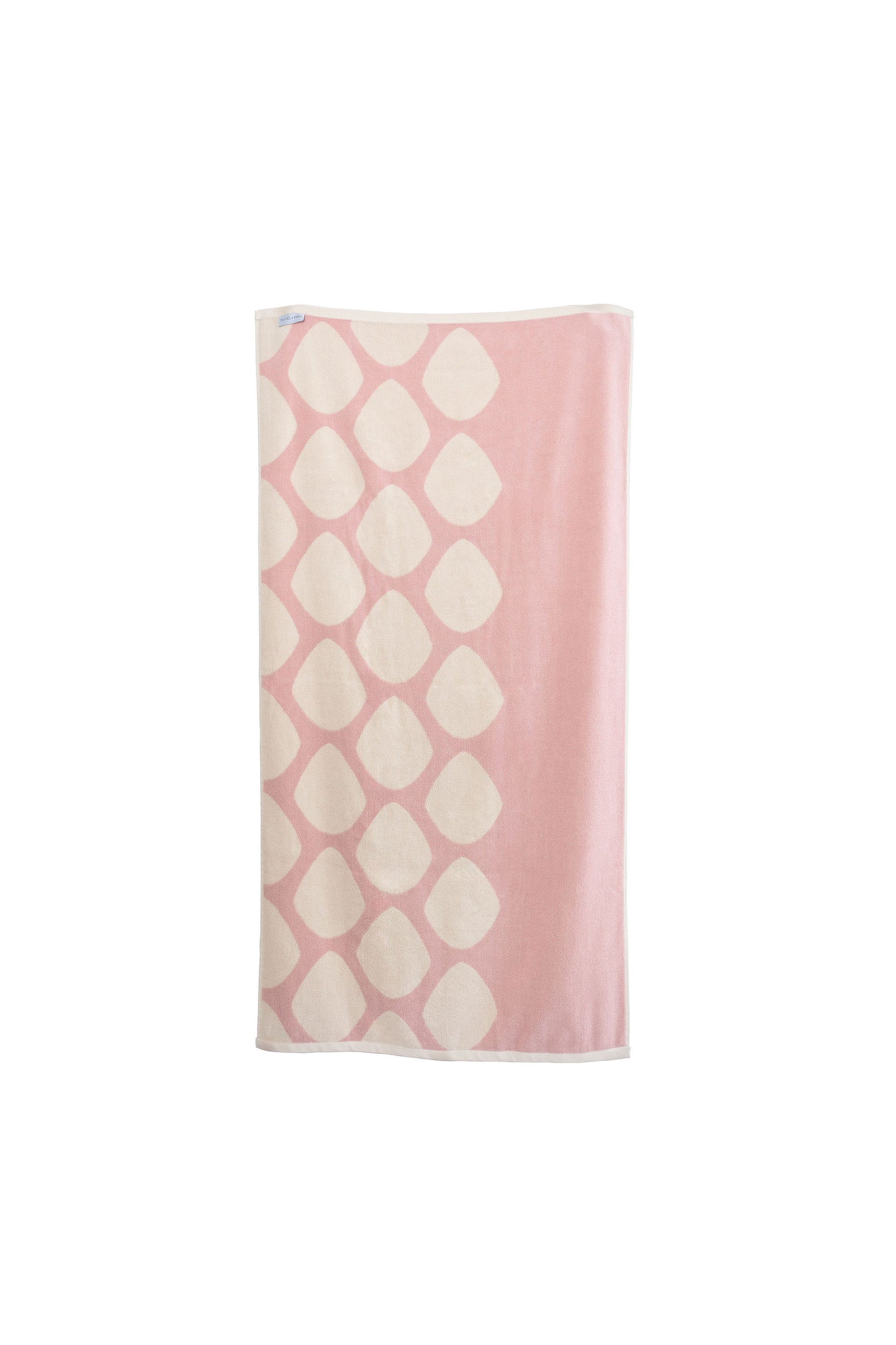 Reversible pink bath towel